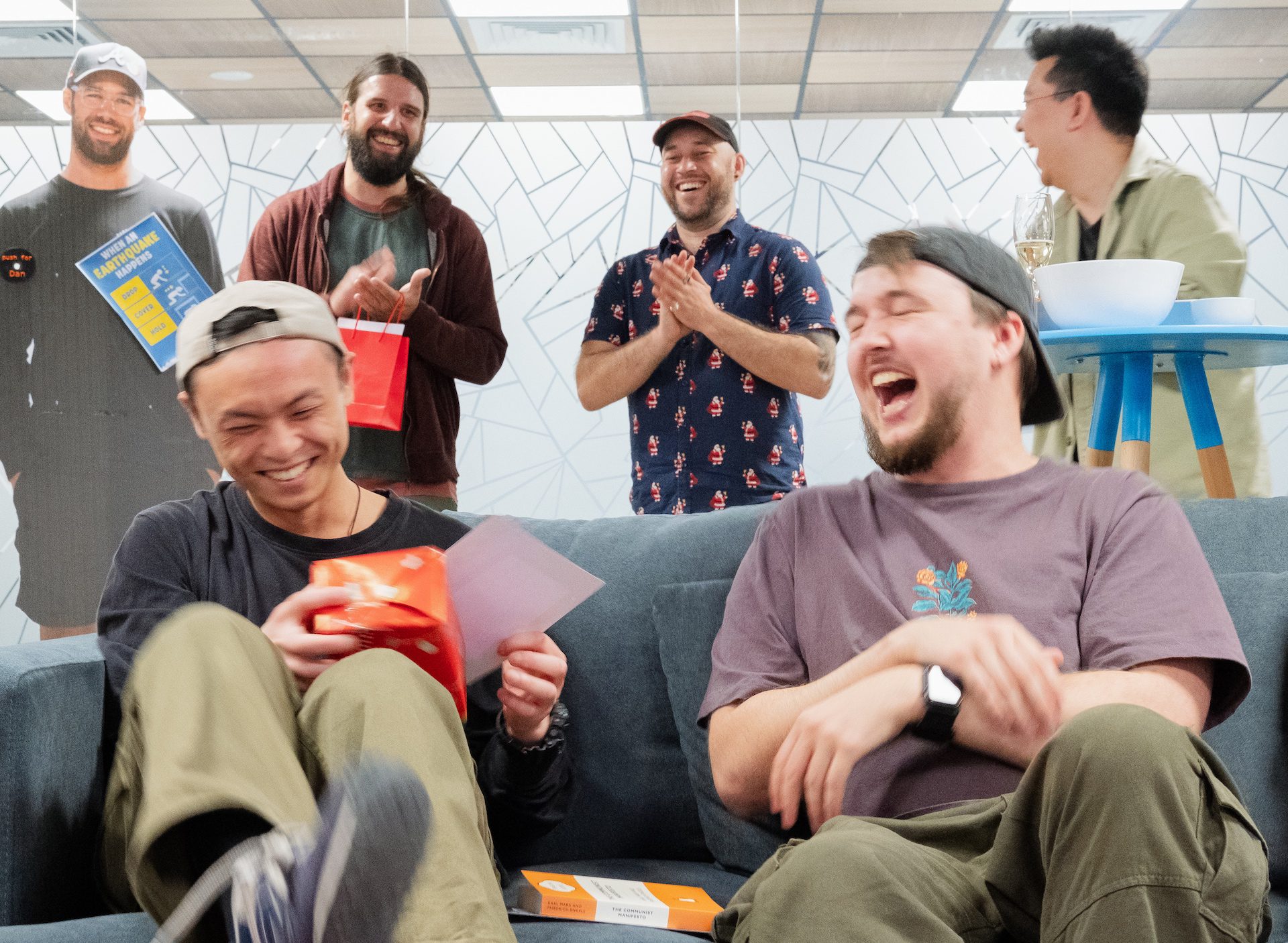 The PaperKite team share a laugh at Merry Gratitudes.